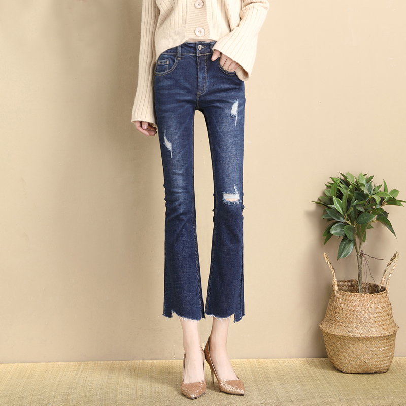 Broken hole micro flared nine point jeans women 2020 spring and autumn new versatile jeans women's elastic raw edge flared pants women